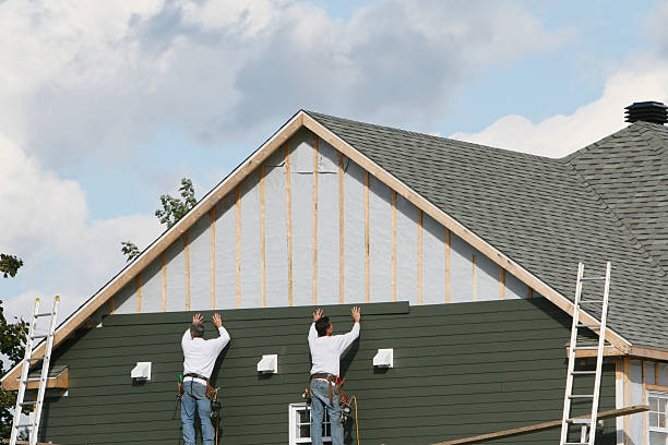 Professional Siding technician working in Refton, PA